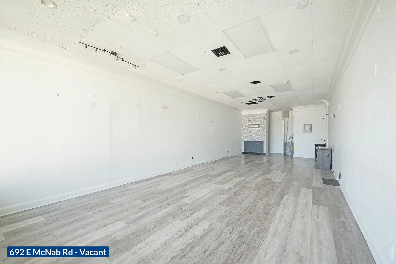 692 E McNab Rd — vacant bay interior